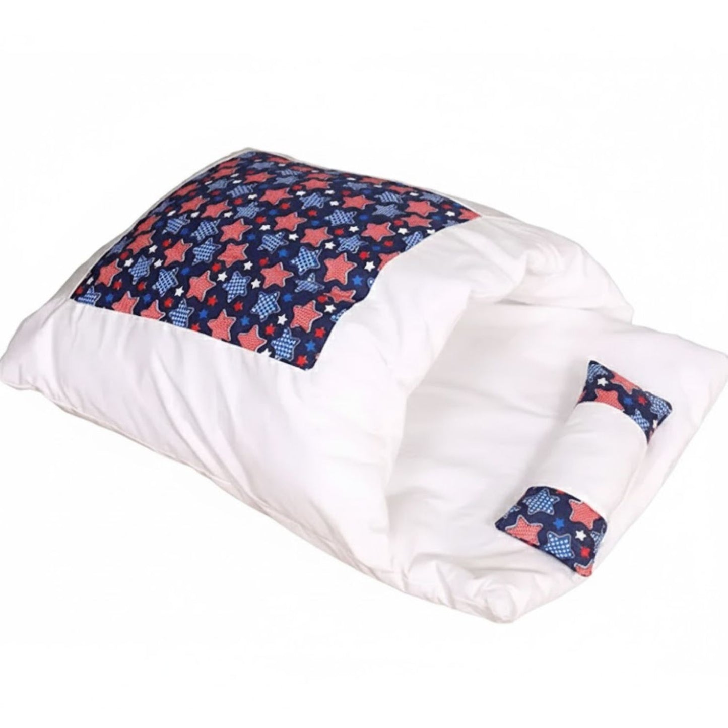 White cat blanket with red and blue star pattern